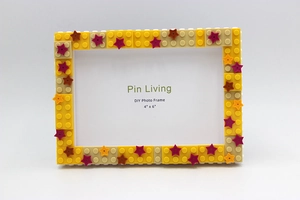 Close-up of yellow and tan DIY building block photo frame for 4x6 inch pictures