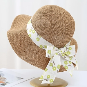 Breathable woven straw sun hat with large brim and floral bow ribbon for women