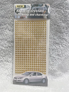 Close-up of 3mm yellow acrylic self-adhesive crystal rhinestone stickers for DIY car decor