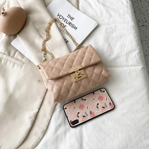 Quilted crossbody chain bag with golden twist lock in elegant pink beige PU leather