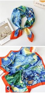 Detailed view of Van Gogh Starry Night silk scarf with elegant orange border