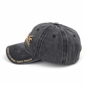 Detail of vintage washed charcoal baseball cap with khaki letter embroidery on the brim