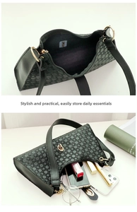 Detail view of dark green textured handbag interior storing phone and sunglasses