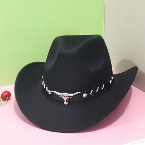 Detail of black felt cowboy hat featuring leather band with silver bull head emblem