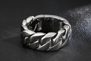 Detailed close-up of 316L stainless steel bracelet with engraved material markings