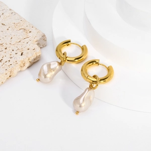 Elegant 18K gold stainless steel hoop earrings with baroque pearls on stone display