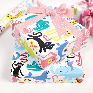 Eco-friendly gift wrapping paper with colorful cartoon animal patterns and pink ribbons