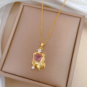 Titanium steel necklace with pink gemstone pendant and golden butterfly pearl detail