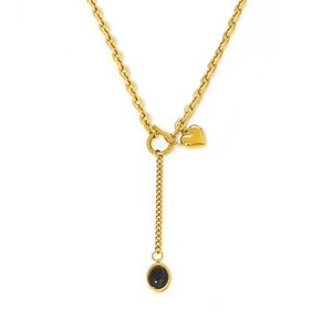 Golden heart necklace with black oval pendant and OT toggle clasp on a white background