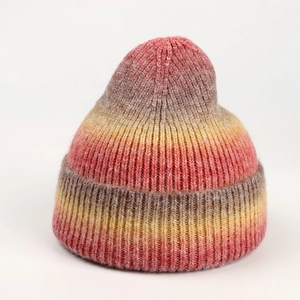Rainbow gradient knit beanie hat with thick ribbed cuff for winter warmth
