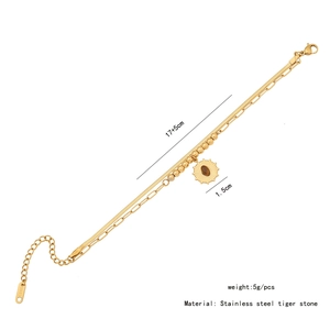Detail showing the 17+5cm adjustable chain and tiger eye pendant on stainless steel bracelet