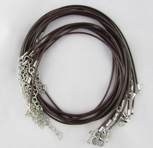 Close-up of dark brown wax cord necklace with silver lobster clasp and extender chain
