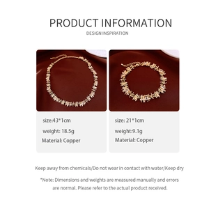 Detail of copper gold necklace and bracelet set featuring rectangular zircon stones