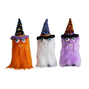 Three Halloween gnome plush dolls with wizard hats and vampire fangs on white background