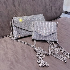 Sparkling silver rhinestone evening bags with metal chains in two assorted sizes