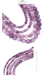 Macro detail of natural purple amethyst beads showing round shape and mineral textures