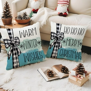 Linen Christmas pillow covers with snowman print and festive patterns on a white rug