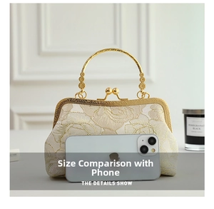 Detail shot of mini cheongsam handbag size compared with a smartphone and gold embroidery