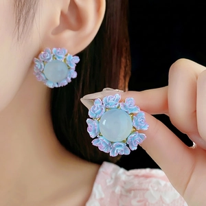 Floral stud earrings with blue opal center and soft pink rose petals for women