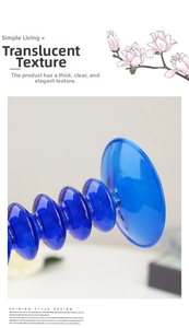 Macro shot of blue transparent glass candle holder with elegant spiral base design