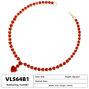 Detail of gold-plated brass heart necklace with red zircon stones and size specifications