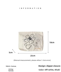Canvas makeup bag dimensions 25cm x 18cm x 5cm with floral embroidery and zipper
