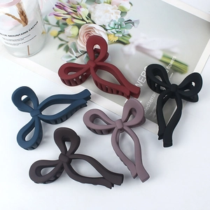 Large matte bow hair claws set in burgundy, navy, black, brown and pink colors