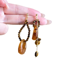 Asymmetric resin tiger eye flower earrings with silver needle and gold finish