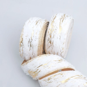 Detail of white plush ribbon with gold foil texture for Christmas DIY floral decoration
