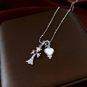Cross necklace with red zircon and mother of pearl heart pendant on bead chain