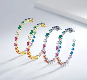 Close-up of S925 sterling silver hoop earrings with multi-color zircon stone inlay