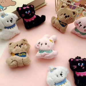 Set of 8 cute cartoon animal plush brooches featuring cats dogs and bears on pink background