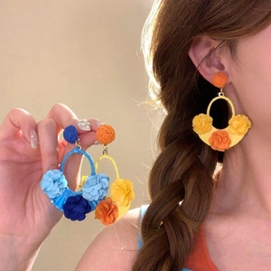 Exaggerated colorful flower hoop earrings for beach vacation style