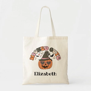 Close-up of Wicked Cute Halloween canvas tote bag with custom name and pumpkin print