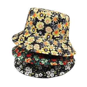 Floral print reversible bucket hats in yellow, red and black colors for sun protection