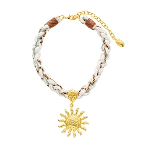 Metallic sun pendant necklace with braided white cord and gold lobster clasp