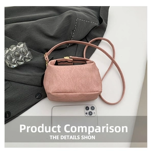 Pink matte crossbody bag shown next to a smartphone for a direct size comparison