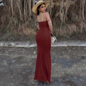 Detail of red backless bodycon maxi dress with side stripes and slim straps for summer