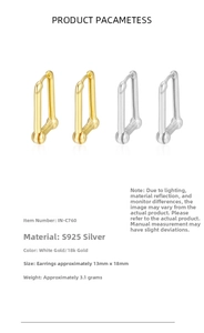 Macro detail of geometric S925 sterling silver hoop earrings with size 13mm by 18mm