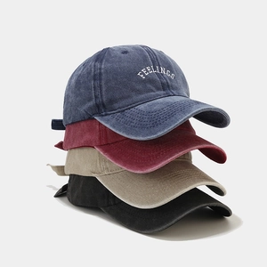 Vintage washed cotton baseball caps in four colors featuring FEELINGS embroidery detail