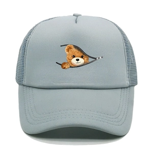 Detail of breathable mesh back and cartoon bear print on light blue trucker hat