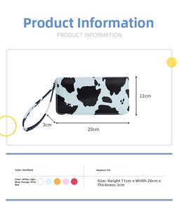 Detailed view of blue cow print long PU leather wallet with size 20x11x3cm and wrist strap