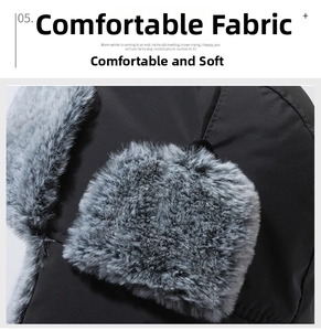 Detailed view of winter trapper hat showing soft grey faux fur lining and thick black fabric