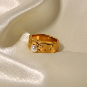 18K gold plated stainless steel lava ring with white pearl on elegant white silk