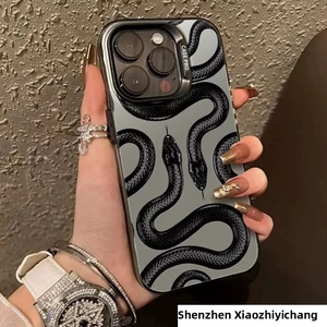 Detail showing creative realistic black python snake patterns on cement grey iPhone case