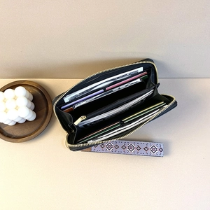 Black long zipper wallet for women with large capacity slots and patterned wrist strap