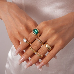 Set of 6 vintage gold geometric rings with green emerald-cut crystal and rhinestones