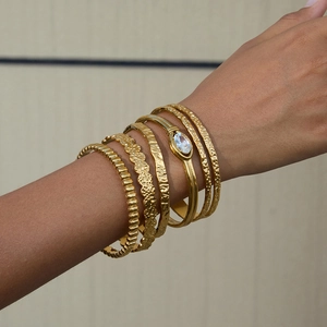 Elegant 18k gold plated stainless steel bangles set with marquise zircon on model wrist
