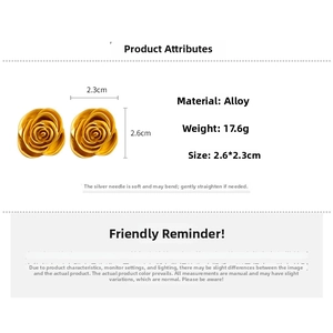 Detailed view of golden rose earrings with silver needles and size measurements