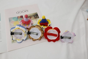 Detail of 6-piece handmade crochet mini hat and flower hair clips with metal alligator clips